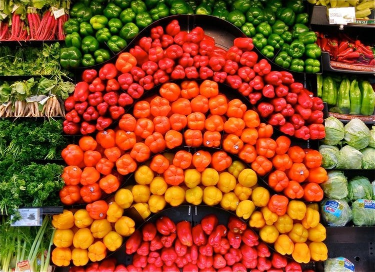 A variety of fresh fruit and vegetables on display
Description generated with very high confidence A variety of fresh fruit and vegetables on display
Description generated with very high confidence