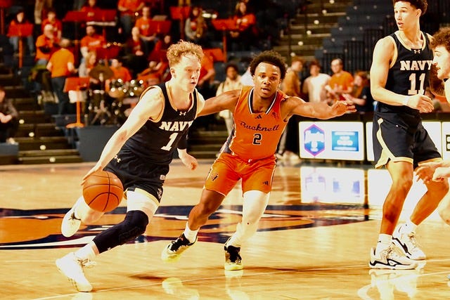 Cruising into March Madness: Navy basketball dominates the Patriot League, riding elite defense and veteran leadership. [Photo Credit: Keith Martin]