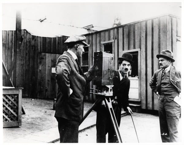 Kid Auto Races at Venice (1914), the first film released in which Chaplin wore the Tramp costume Kid Auto Races at Venice (1914), the first film released in which Chaplin wore the Tramp costume