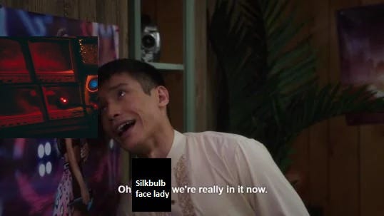An edited version of the "oh Ariana we're really in it now" moment from The Good Place, except Ariana has been overlaid with a screenshot of the lady from the Silkbulb Test and the text says "oh silkbulb face lady we're really in it now."