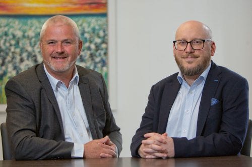 Andrew Diamond, managing partner of Lindsays, with David McElroy, managing partner of Dallas McMillan