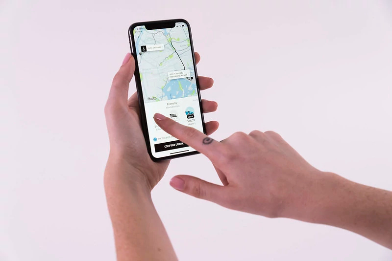 Customer reserving a car on Uber.