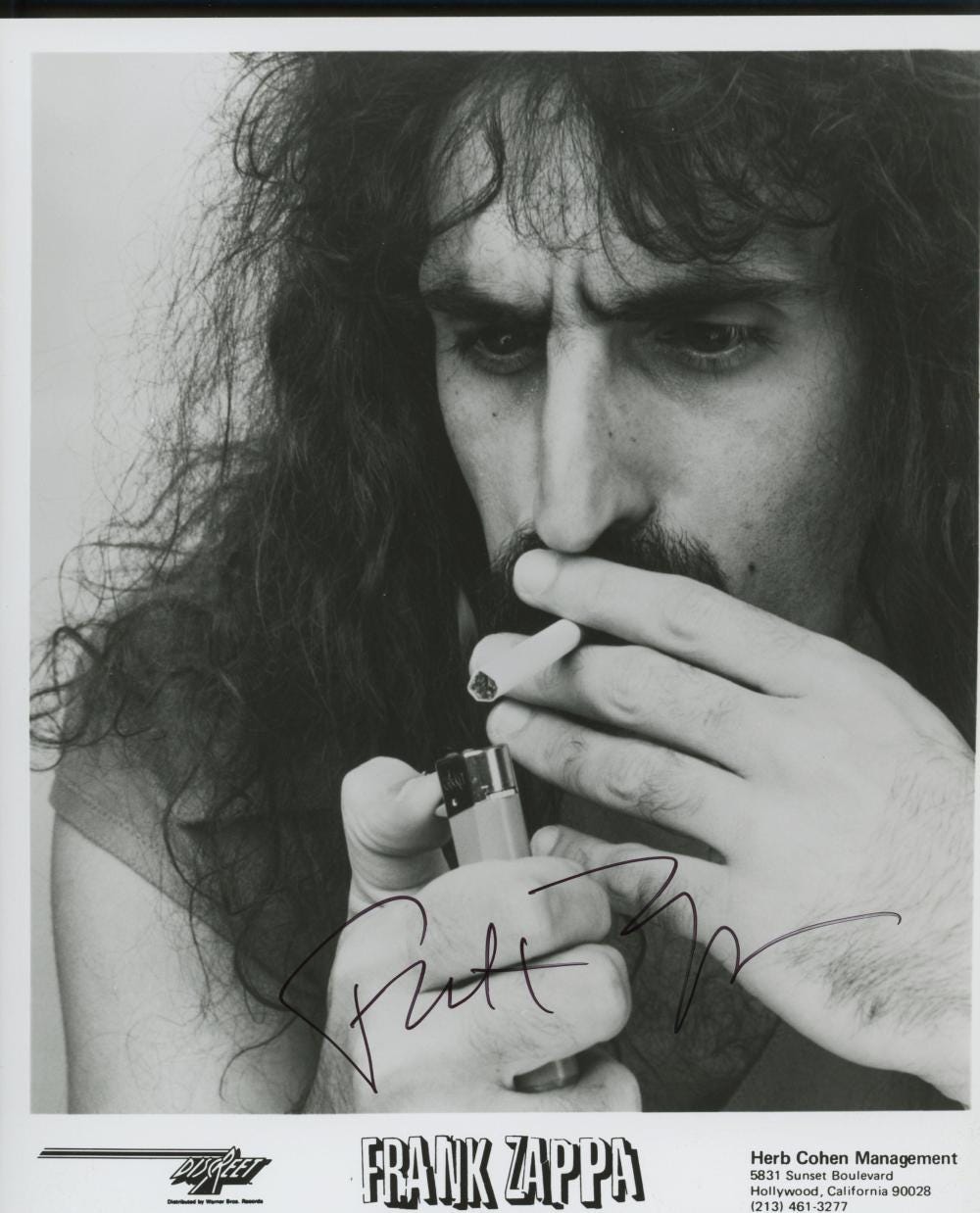 Sold at Auction: Frank Zappa signed photo