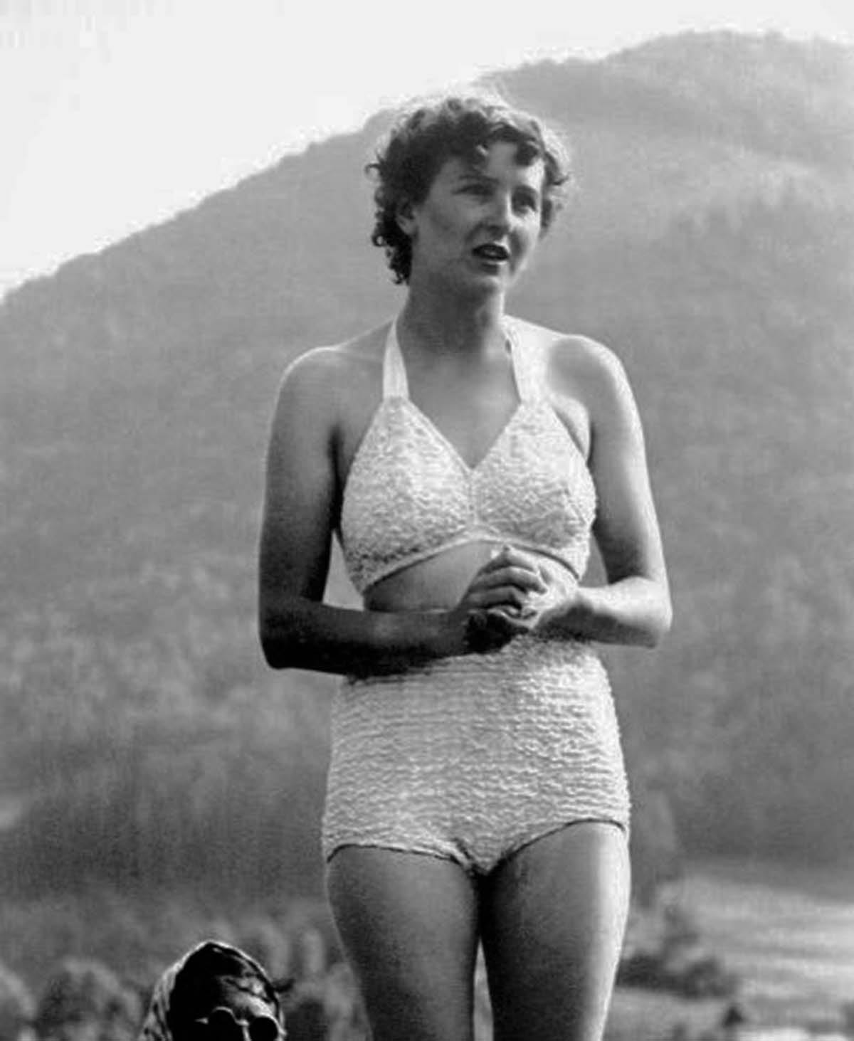 Eva Braun captured in a moment of relaxation after a swim. Eva Braun captured in a moment of relaxation after a swim.