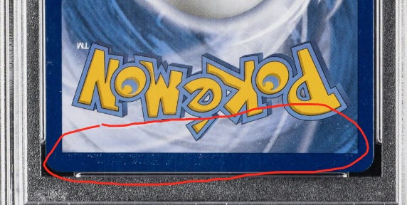 White dots on the back of PSA 10 2017 Mewtwo GX #78