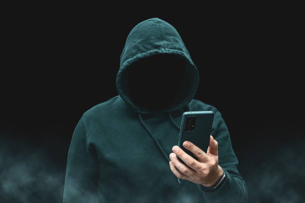 4,000+ Man Hoodie Phone Stock Photos, Pictures & Royalty-Free Images -  iStock