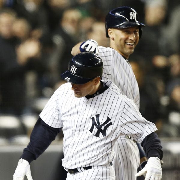 Derek Jeter greets Dean Anna after his first career home run Derek Jeter greets Dean Anna after his first career home run