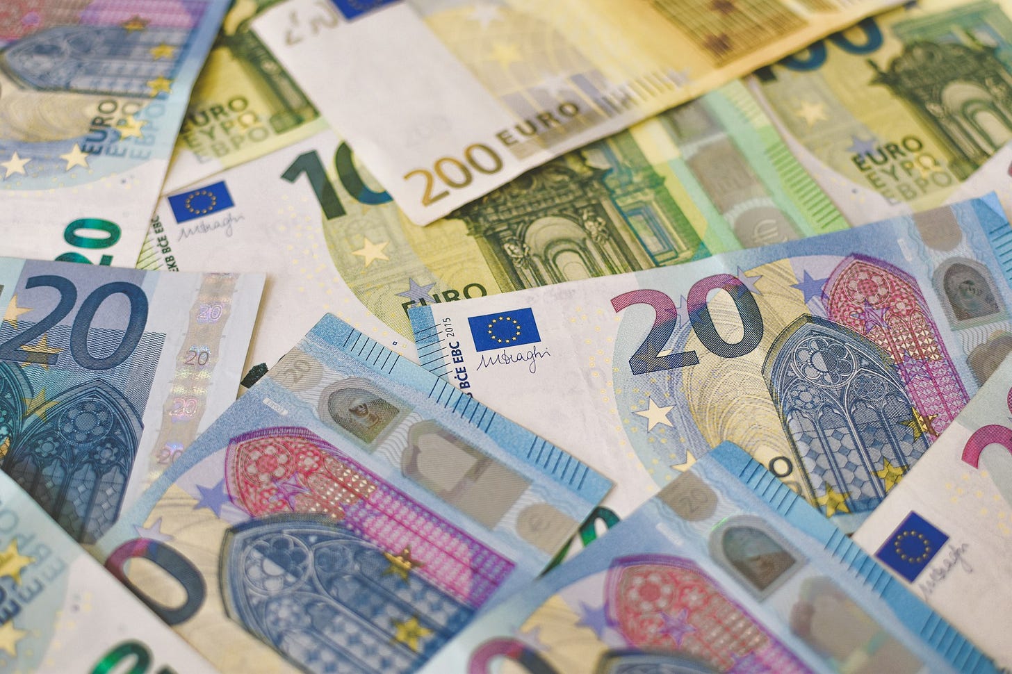 pile of Euro notes pile of Euro notes