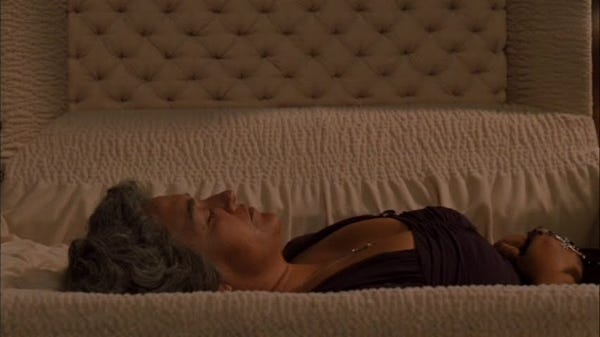 The Holy Mother adorns the background of Don Corleone's business, as 40 years later his widow dies, and the Corleone family descends into fratricide and isolation.&nbsp;