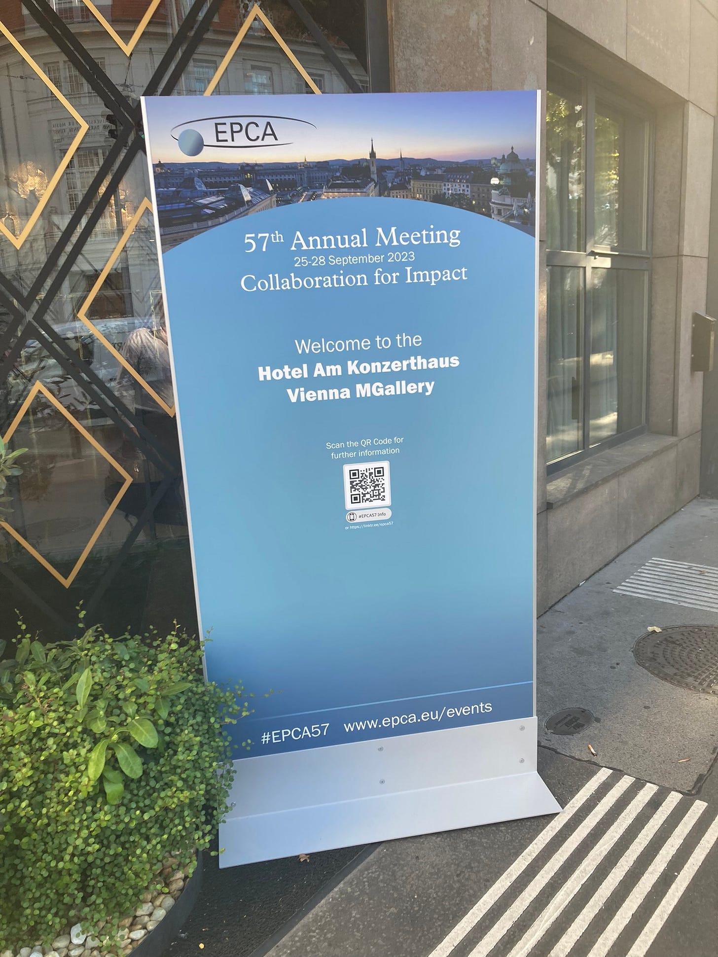 Pull up poster of the 2023 EPCA gathering in Vienna, Austria.