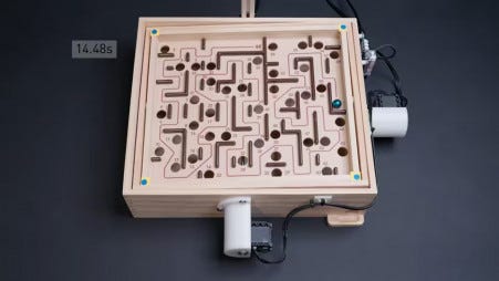 Meet CyberRunner, the robot from ETH Zurich, which mastered a physical maze game to beat humans, and pave the way for accessible AI research. (Thomas Bi/ YouTube)
