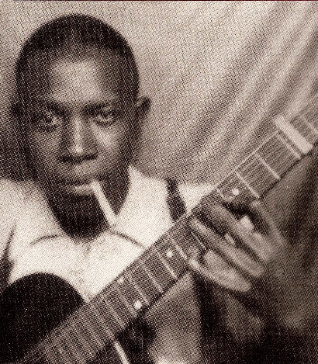 Robert Johnson
“ Technically, Johnson the guitarist was an anomaly. He could sing and play cross-rhythms on the guitar, relating the parts in such complex syncopations that, as Richards notes, “You think, ‘This guy must have three brains!’” Johnson...