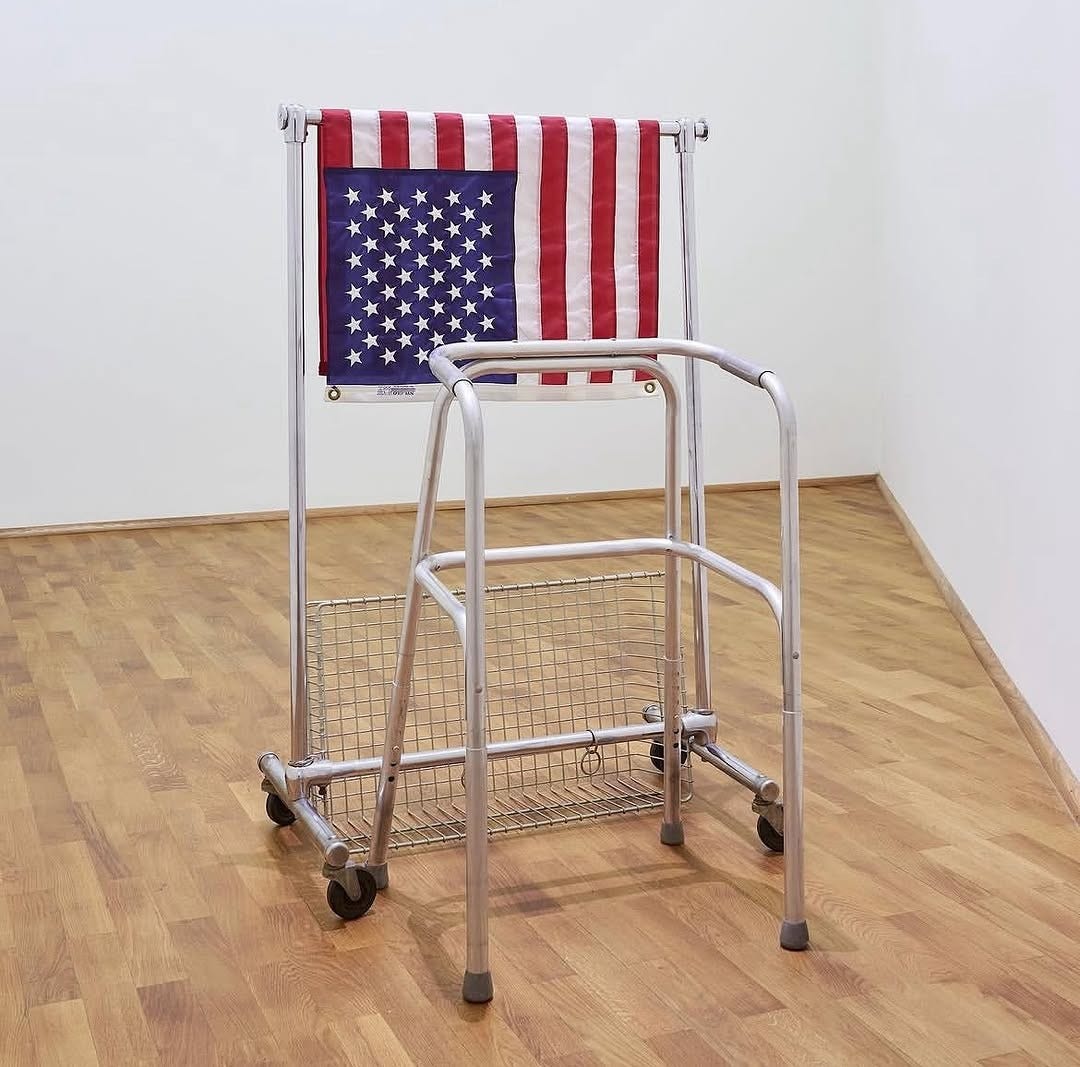 An Instagram  post added by everybodysbusy on Apr 18, 2025. The author is @fakewhale_xyz. May present: flag of the united states, 現代美術館, the art institute of chicago.