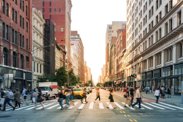 Crowds Of People Walking Through A Busy Crosswalk At The Intersection Of  23rd Street And Fifth Avenue In Midtown Manhattan New York City Stock Photo  - Download Image Now - iStock