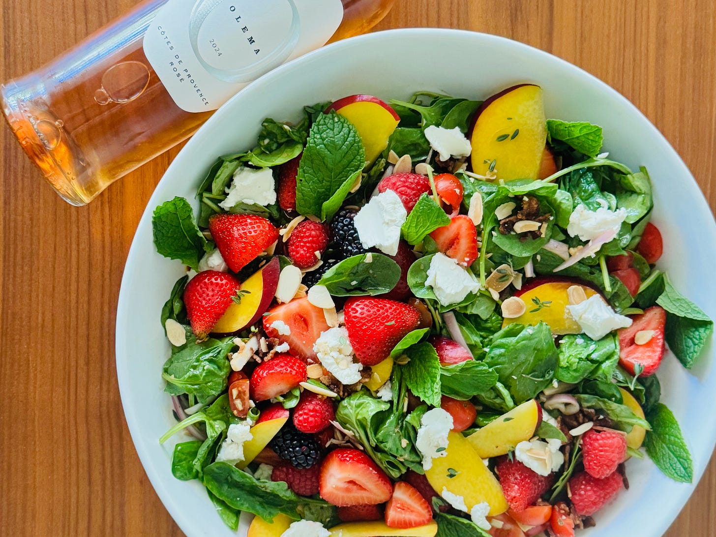 Spinach Salad with Smoked Bacon, Fresh Berries and Goat Cheese paired with a Provençal rosé Spinach Salad with Smoked Bacon, Fresh Berries and Goat Cheese paired with a Provençal rosé