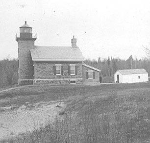 Old black and white image of Grand Island North Lighthouse.