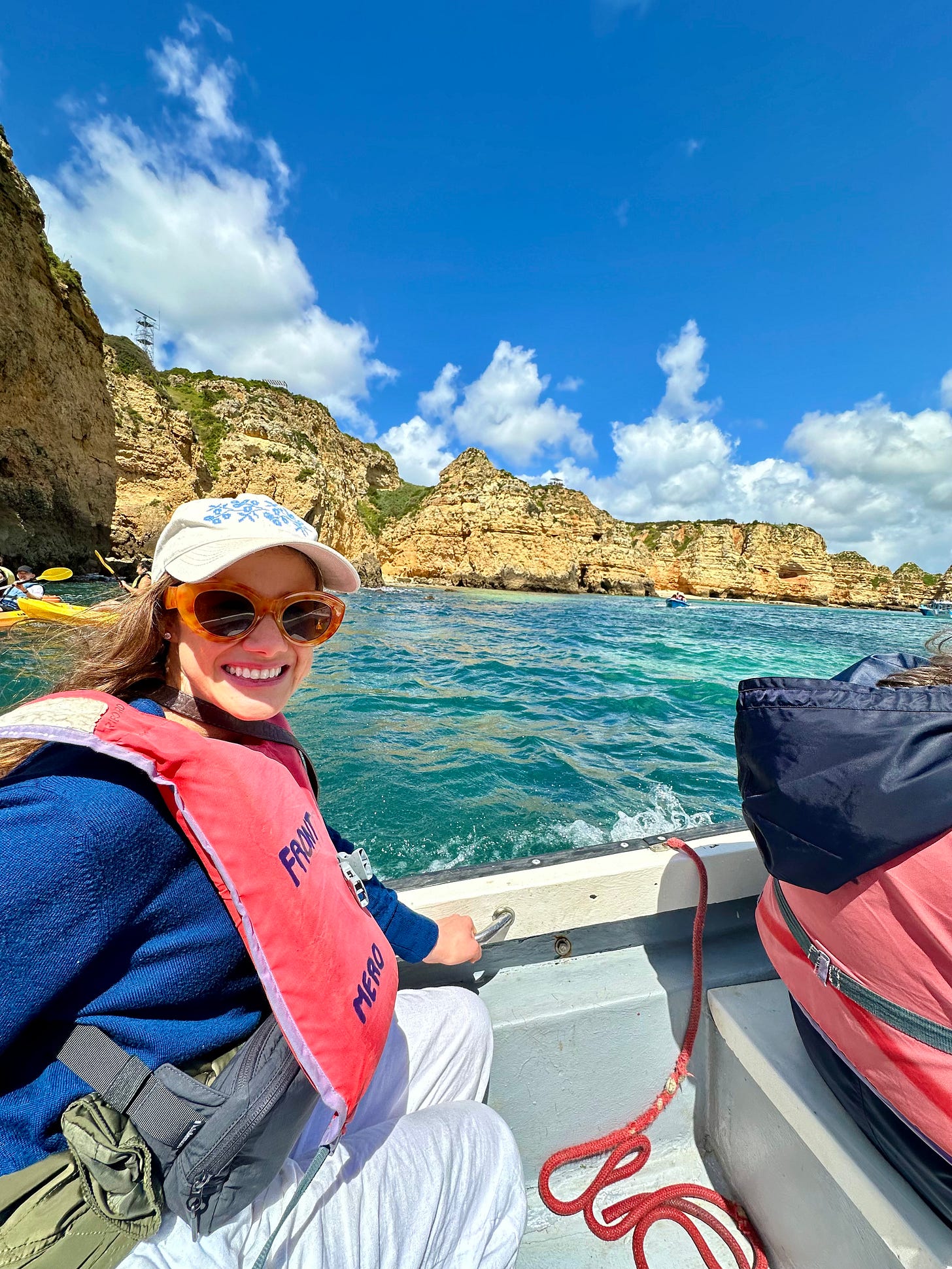 woman on boat ride at Ponta da Piedade woman on boat ride at Ponta da Piedade
