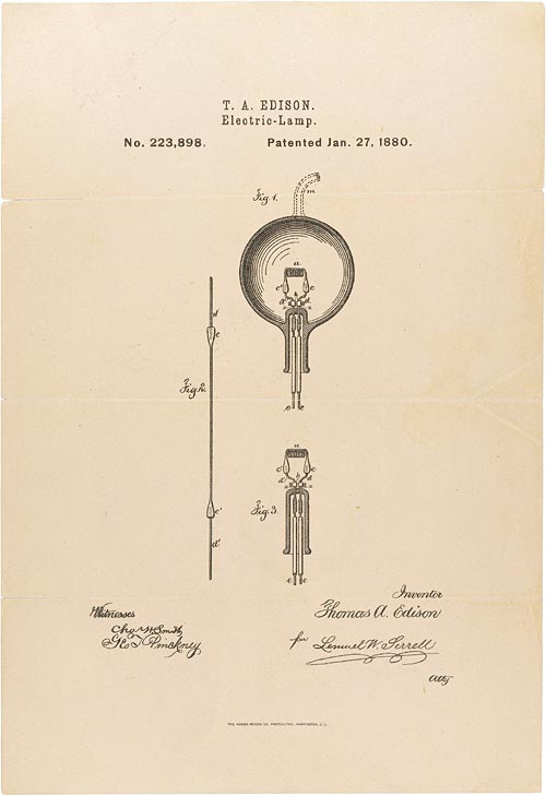 A patent drawing of a light bulb

Description automatically generated