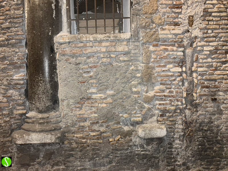 photo by Steve Butcher of spolia - a roman column inserted into a medieval wall in Rome