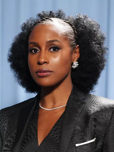 Collage featuring Cardi B, Issa Rae, Angela Bassett, Colin Kaepernick, Doja Cat, Lauryn Hill, and Doechii wearing afro hairstyles at the 2025 Met Gala.
