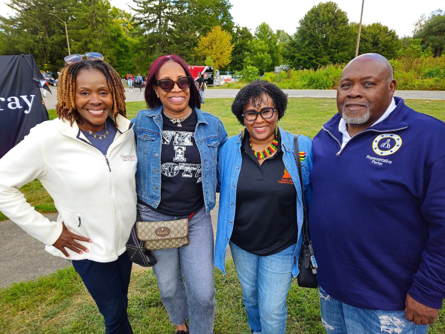 May be an image of 4 people, people smiling and text