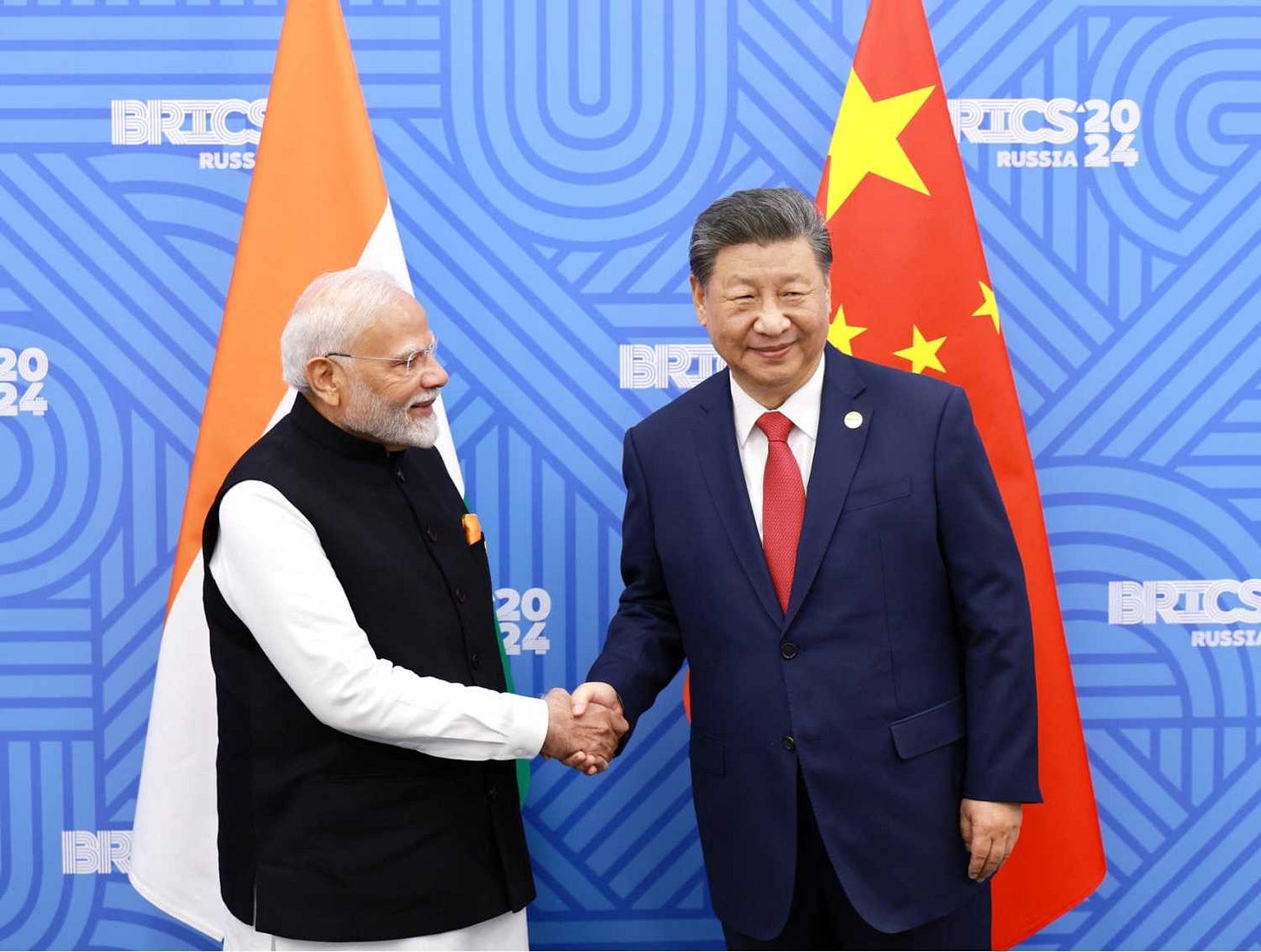 Chinese President Xi Jinping and India Prime Minister Narendra Modi meet on the sidelines of the BRICS summit in Kazan, Russia October 23, 2024.