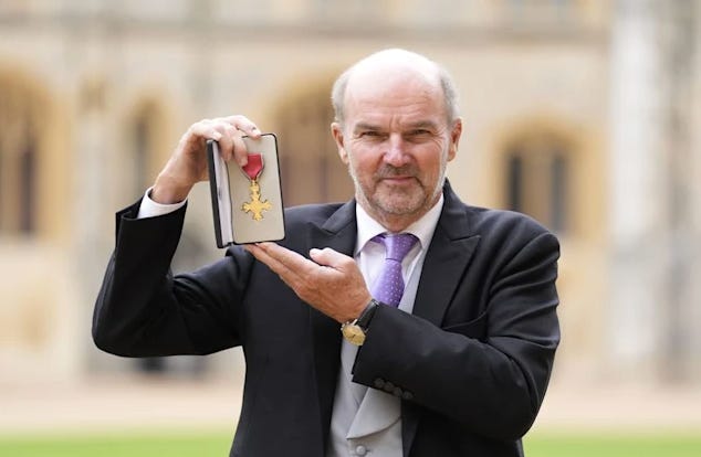 Stephen Lambert with his OBE