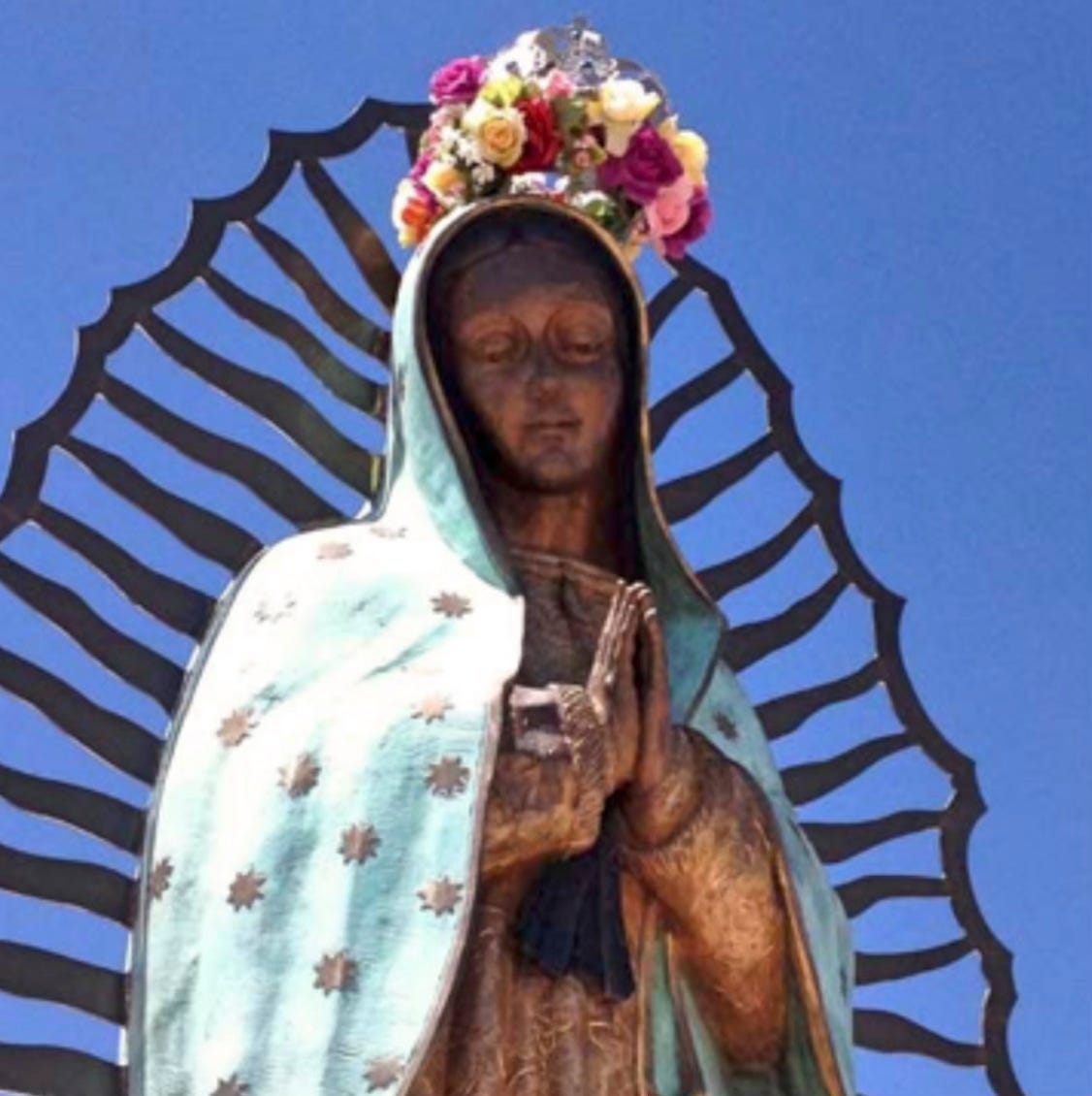 Our Lady of Guadalupe crowned with roses Our Lady of Guadalupe crowned with roses