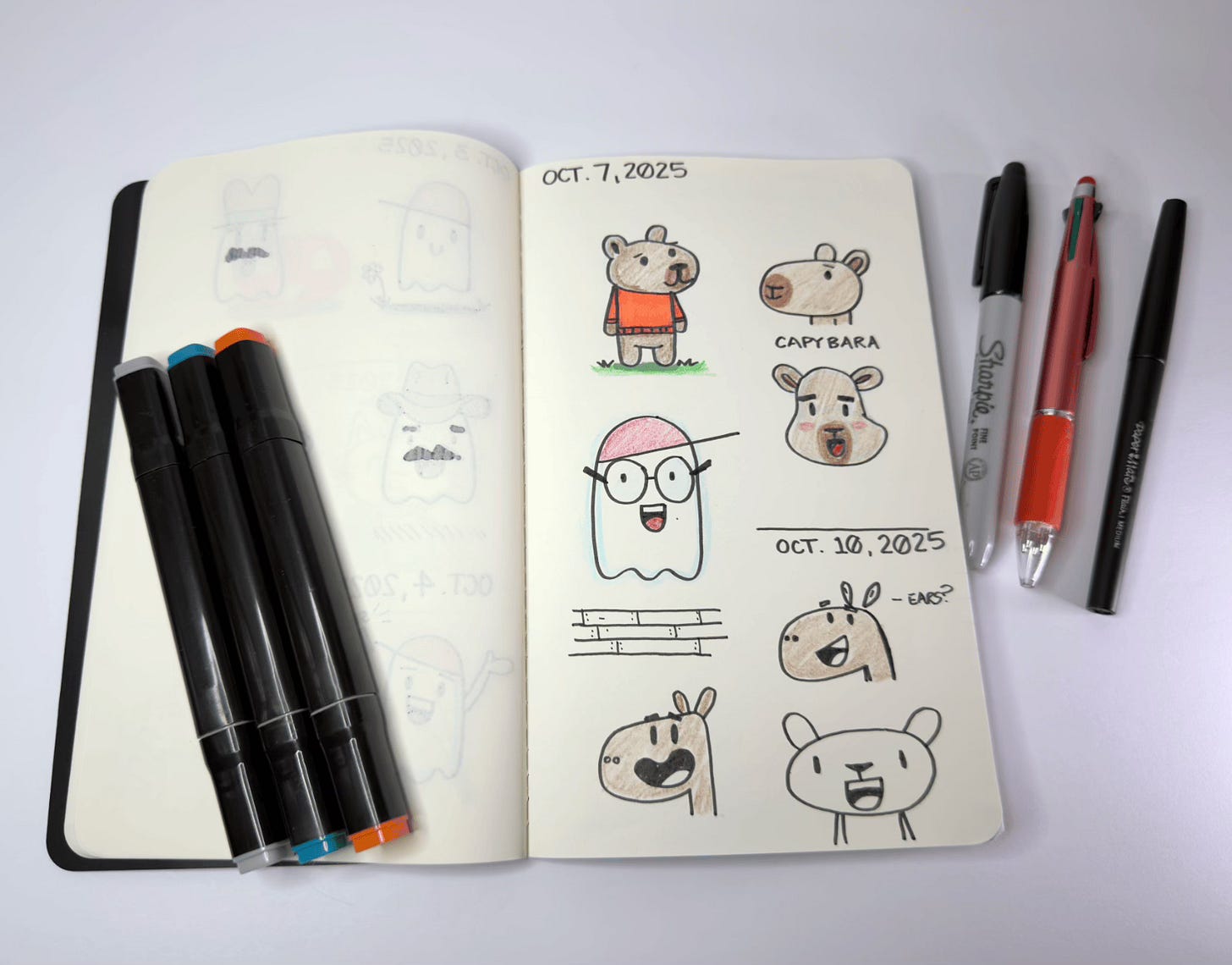 a sketchbook page with cartoon illustrations of a ghost and capybara a sketchbook page with cartoon illustrations of a ghost and capybara