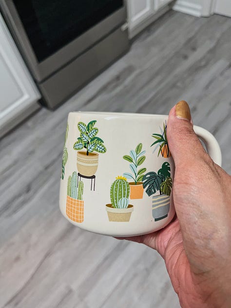 hands holding five pints of ice cream, a hand holding a perfume sample in front of a big green plant leaf, four lip products on a table in front of a sand zen garden and vase, a handful of shaved curly black hair, a hand holding a light beige mug with illustrated plants all over it, an above view of a meal on a plate with toasted english muffins, black tea, mozarella slices, and ramen