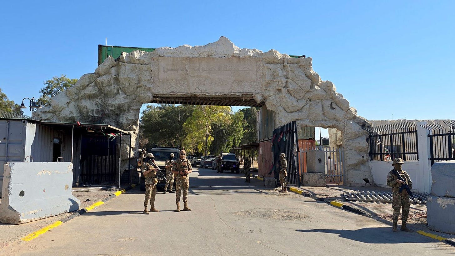 Libyan security forces stand guard at the entrance of Tripoli Zoo on May 28, 2025.