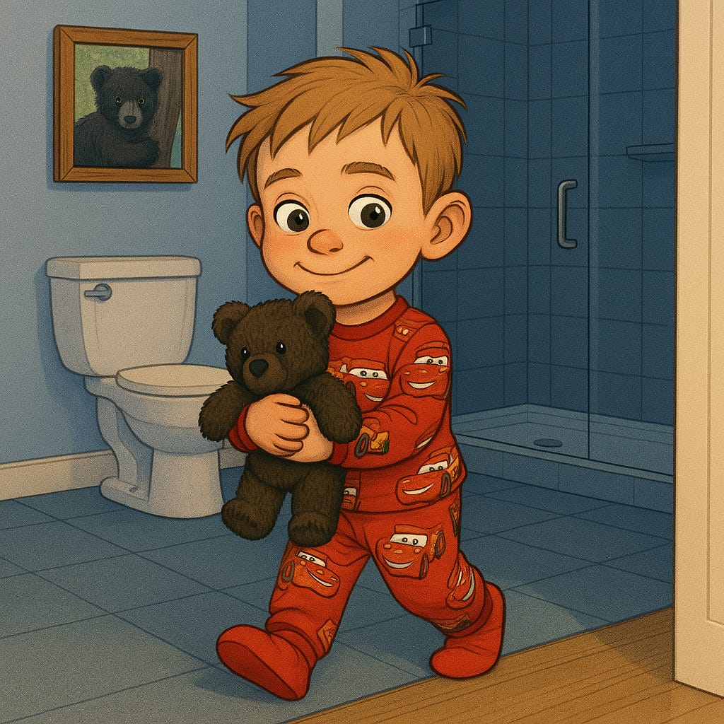 Young boy in red Lightning McQueen pajamas carries a teddy bear while walking out of a modern blue bathroom.