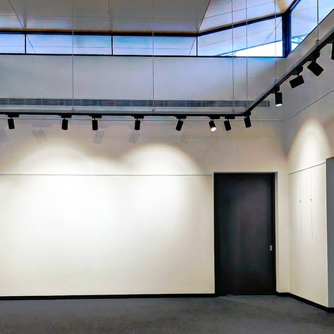 The first part of a multi-gallery photographic series documenting the Cinis Ardor Vitae art exhibition, showcasing light-reactive copper artwork, portraits of artist Michal Plis, and scenes from the venue.