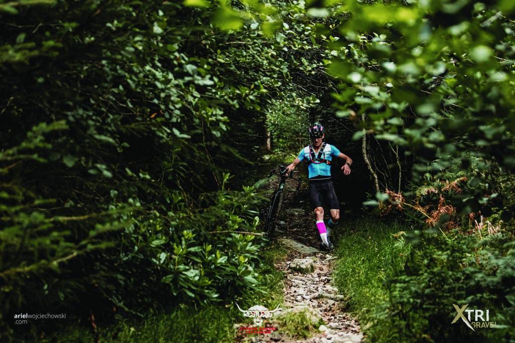 runner in a forest on the trails