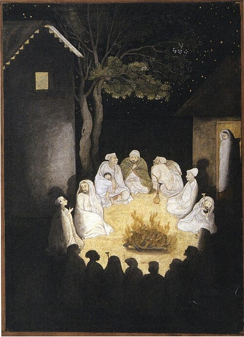 File:Villagers around a fire.jpg