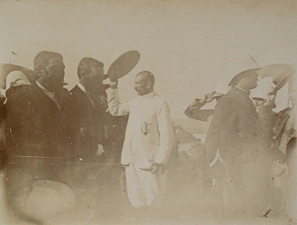 Pastor Lauga accompanies poet Rainandriamampandry to his execution in Antananarivo, Madagascar, October 15, 1896, for his role in the Menalamba rebellion against French rule.