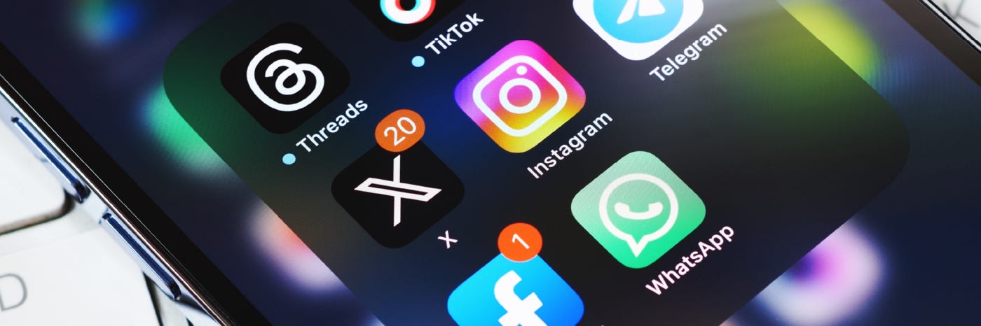 A picture of icons of different social media apps on a cellphone. A picture of icons of different social media apps on a cellphone.