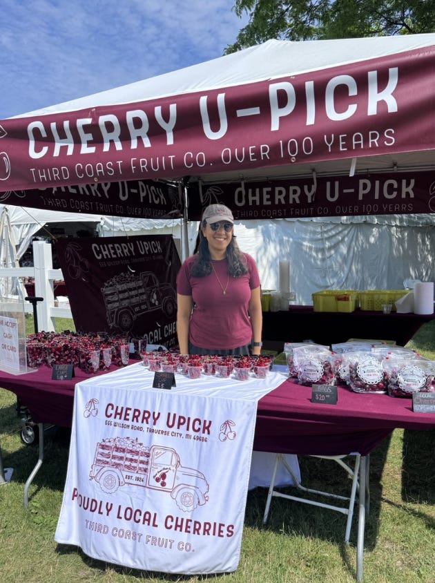 Attia at the Cherry U-Pick stand, the 100th National Cherry Festival