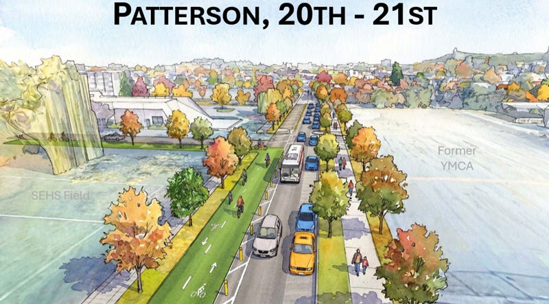 an aerial rendering of a street. From left to right: SEHS field, a sidewalk, a planting strip with trees, two way bike lanes, a buffer zone with bollards, a single lane of vehicle traffic, a parking lane, a planting strip with trees, a sidewalk, and an empty field labeled "former YMCA".