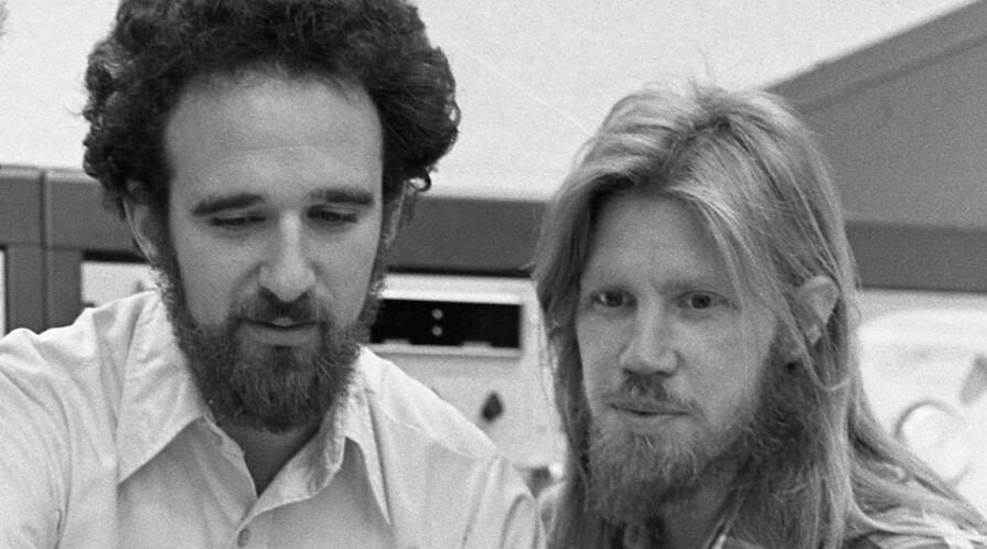 Martin Hellman (center) and Whitfield Diffie (right) the inventors of public-key cryptography are shown in this 1977 photo.
