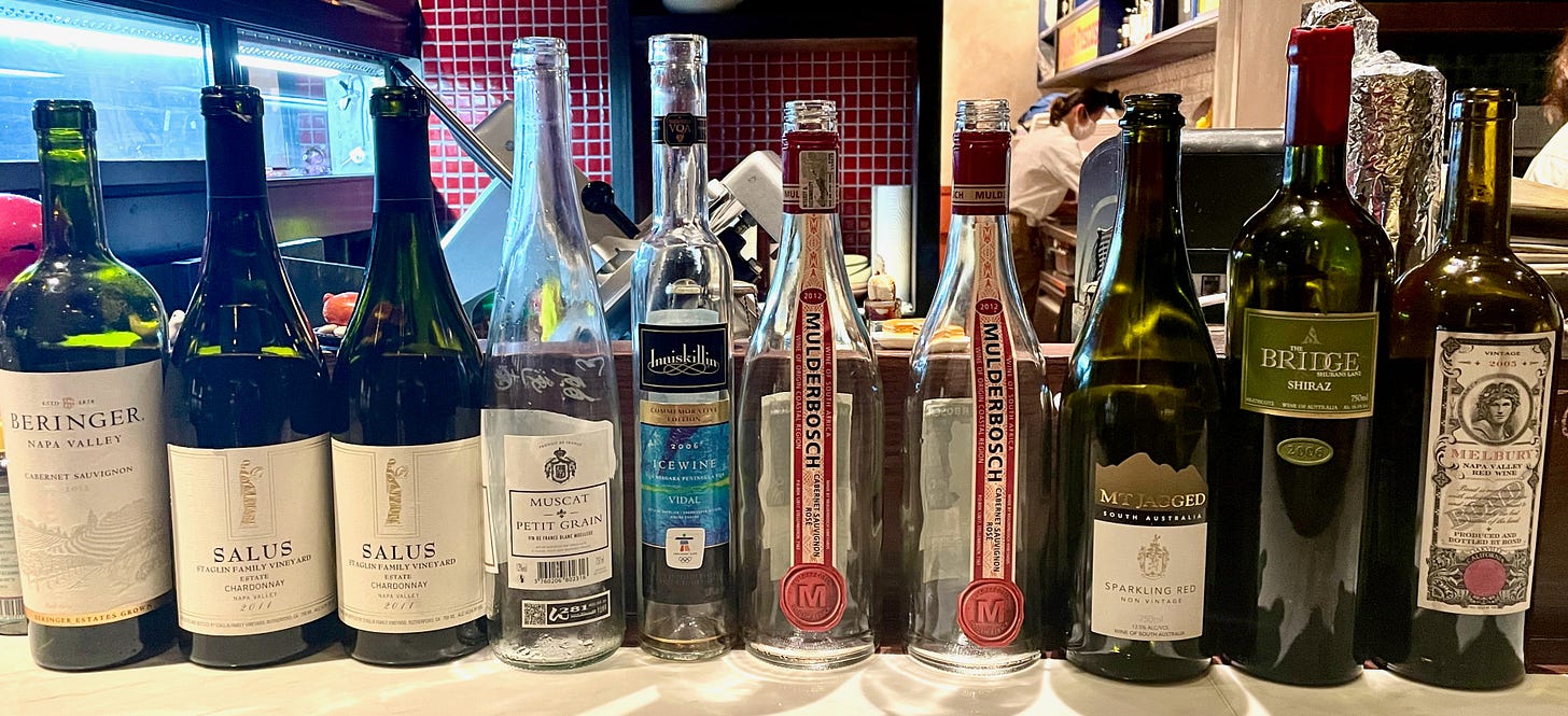 10 empty wine bottles from our dinner.