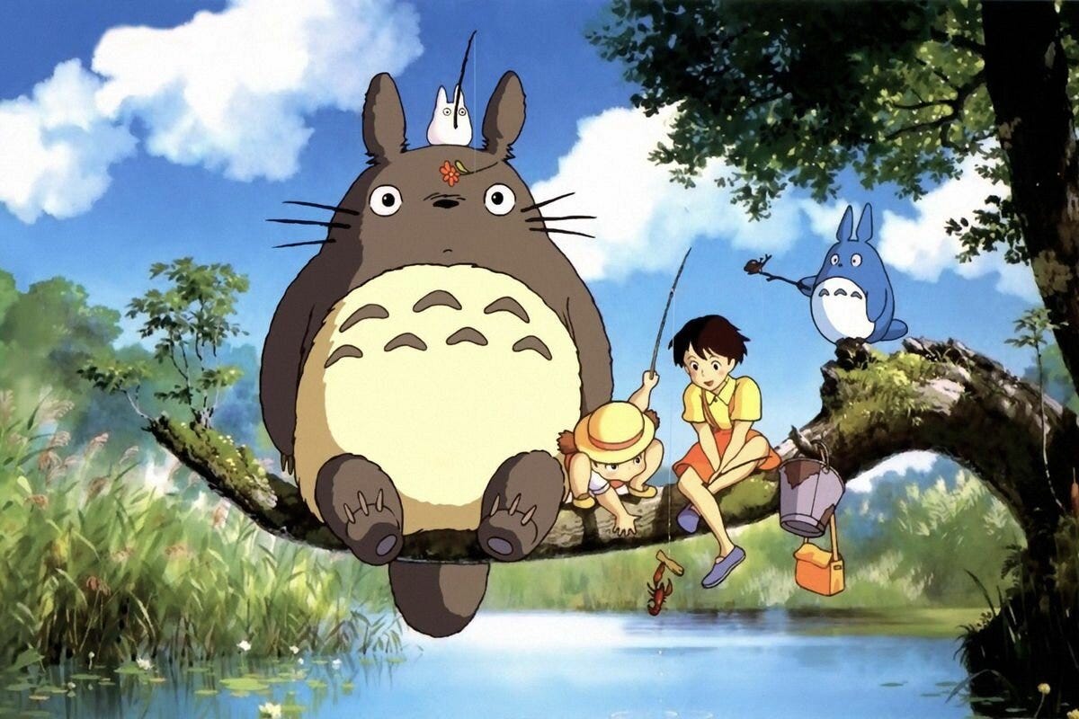 anime cell; two kids sit on a branch staring at the water beside a giant wood spirit rabbity thing with wide eyes; other smaller spirits cluster around, inccluding a white one with a fishing poll sitting on the big one's head