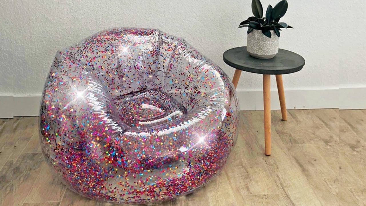 Inflatable transparent chair decorated with glitter.