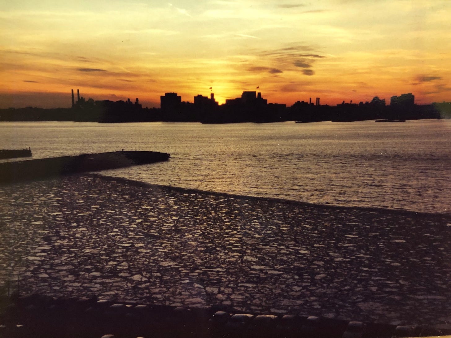 Beautiful sunset over the Hudson river with ice floes. Beautiful sunset over the Hudson river with ice floes.