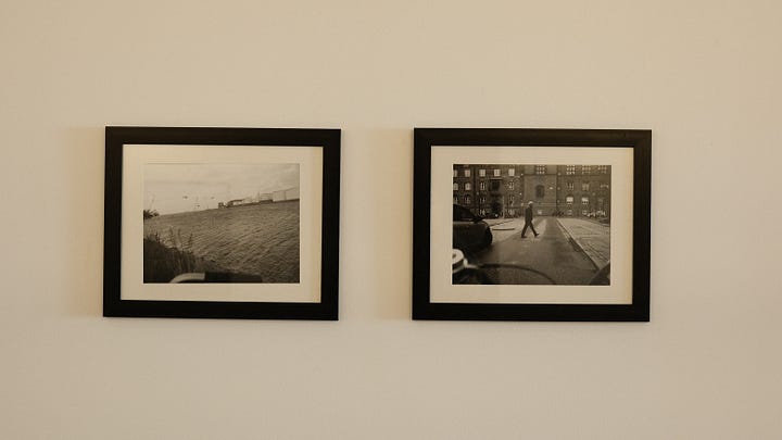 photos of framed pictures on wall