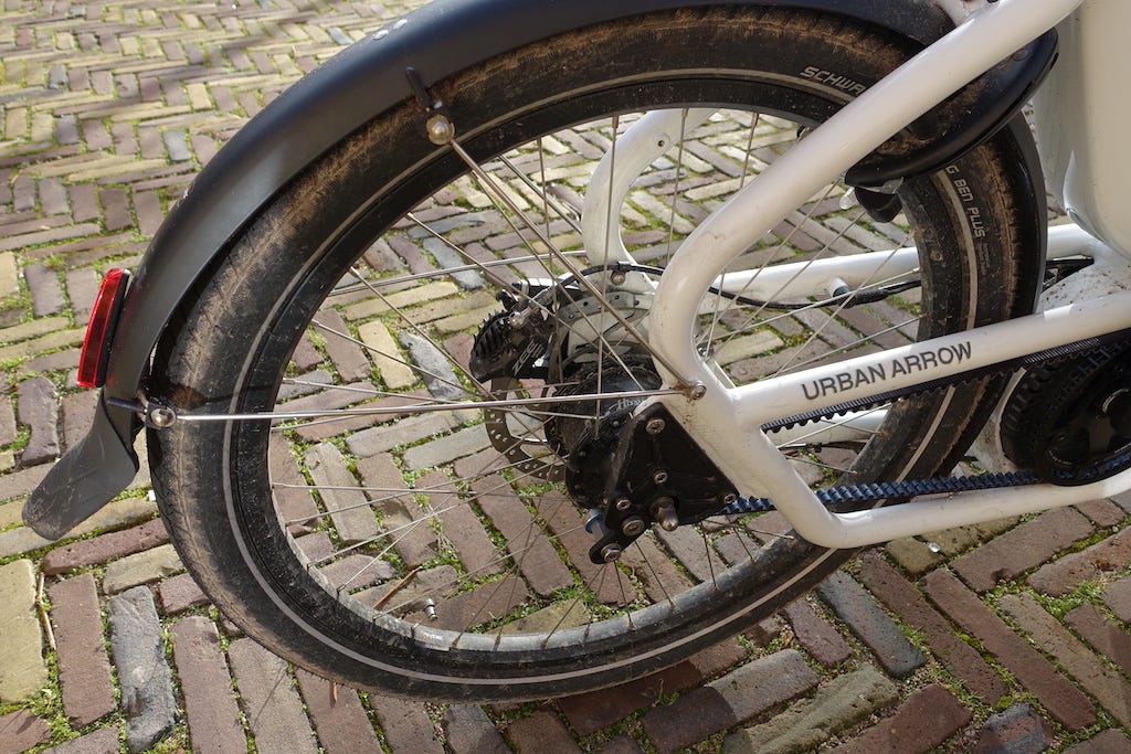 A close up photo of the belt drive on the cargobike. 