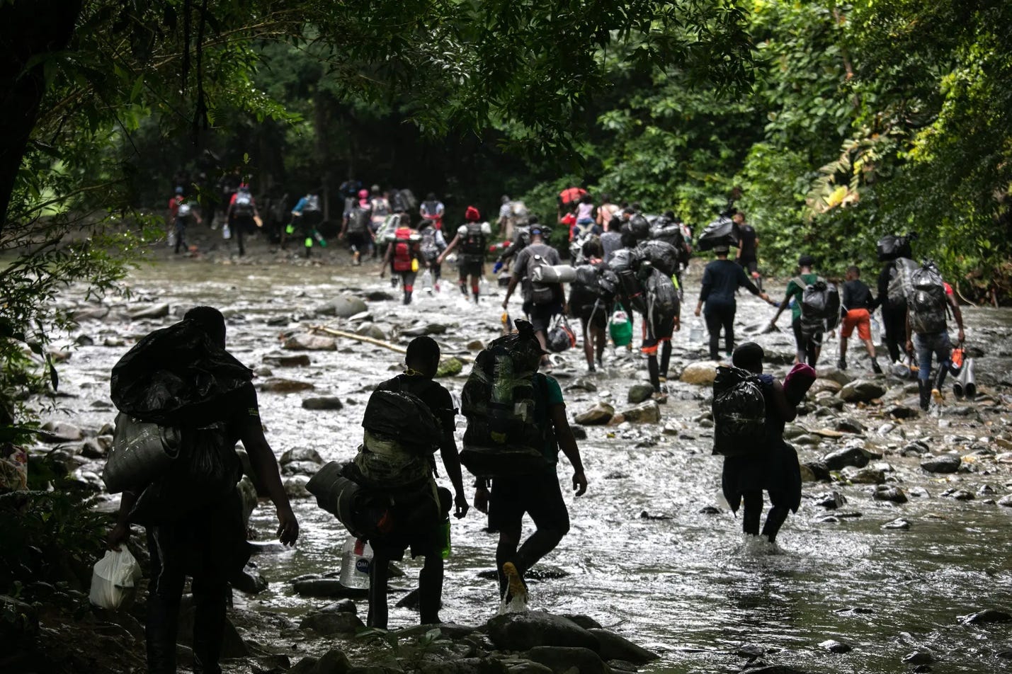 Migrants, most from Haiti, trek through the Darien Gap between Colombia and Panama, on their journey towards the United States Migrants, most from Haiti, trek through the Darien Gap between Colombia and Panama, on their journey towards the United States