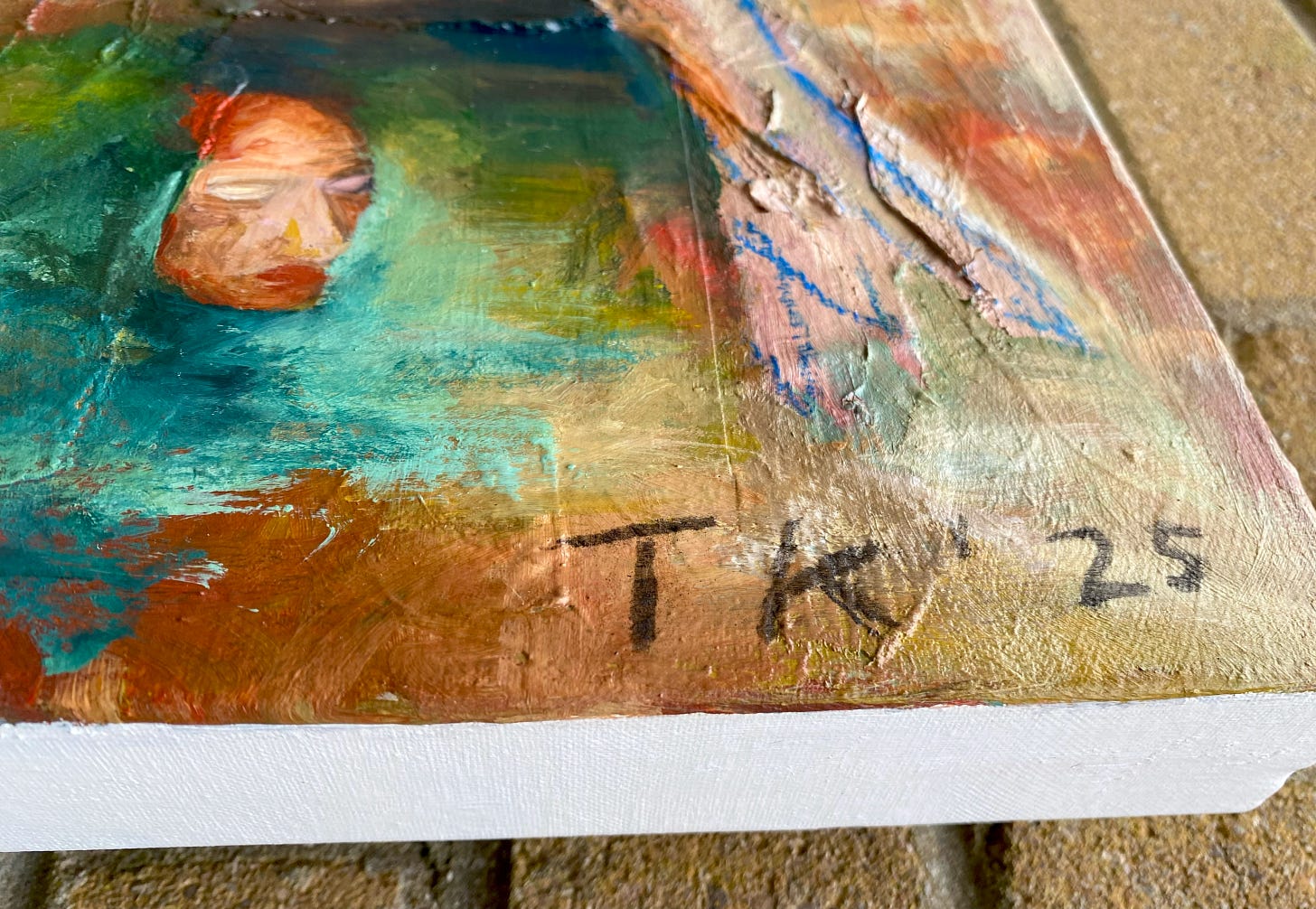 Close-up of a painting by Tarah Kandial showing a face in oranges appearing from a streak of teal and blue brushstrokes.