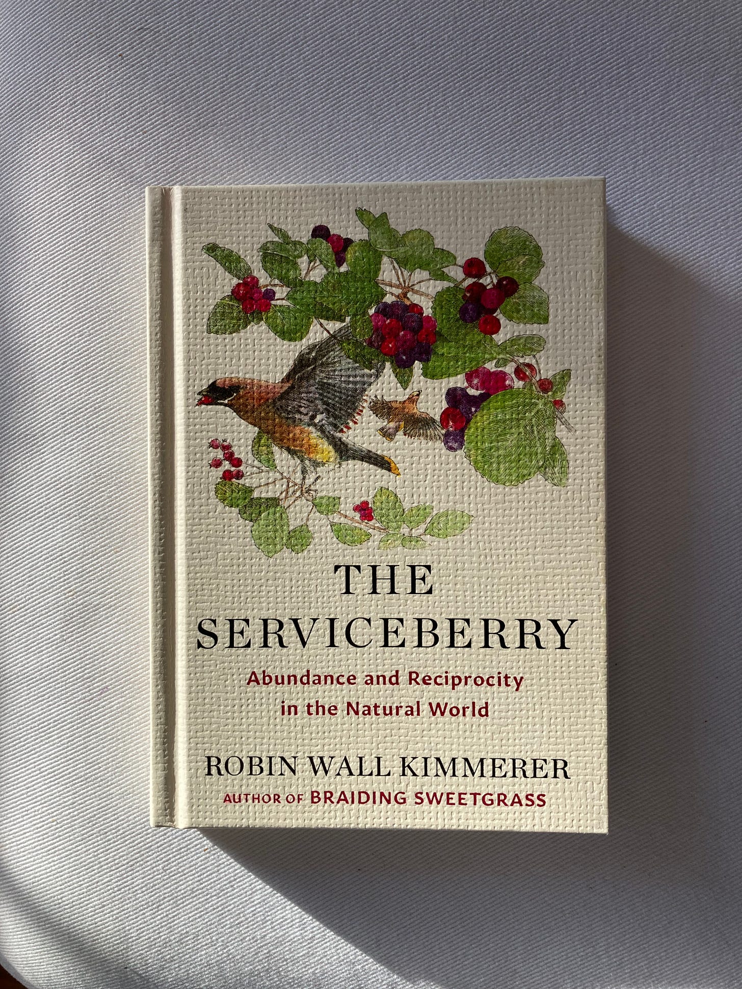 a photo of Robin Wall Kimmerer's book The Serviceberry
