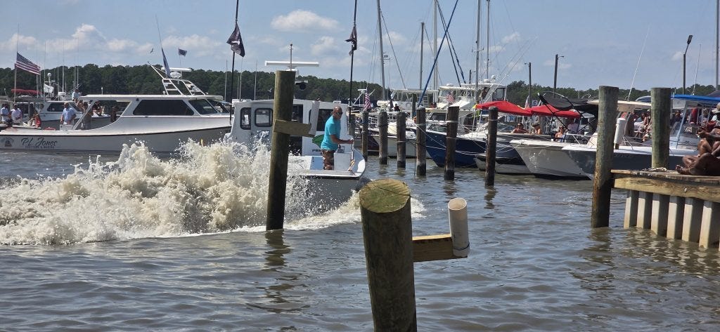 Jake Jacobs brings Outlaw into the slip during the boat-docking contest.